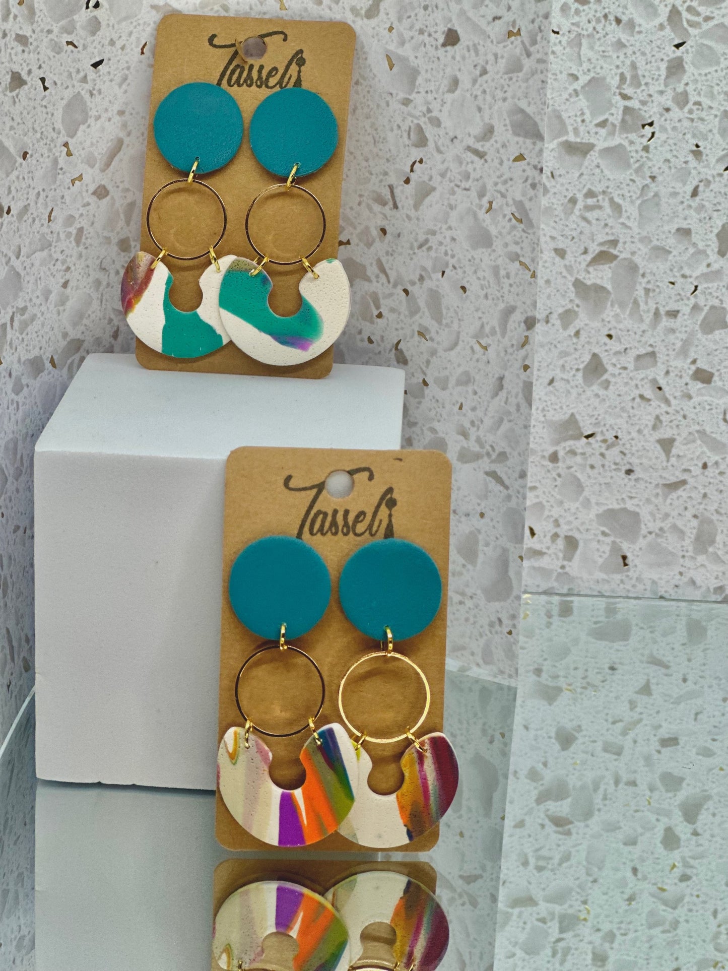 Bright dangle earrings with beach and tropical color palette