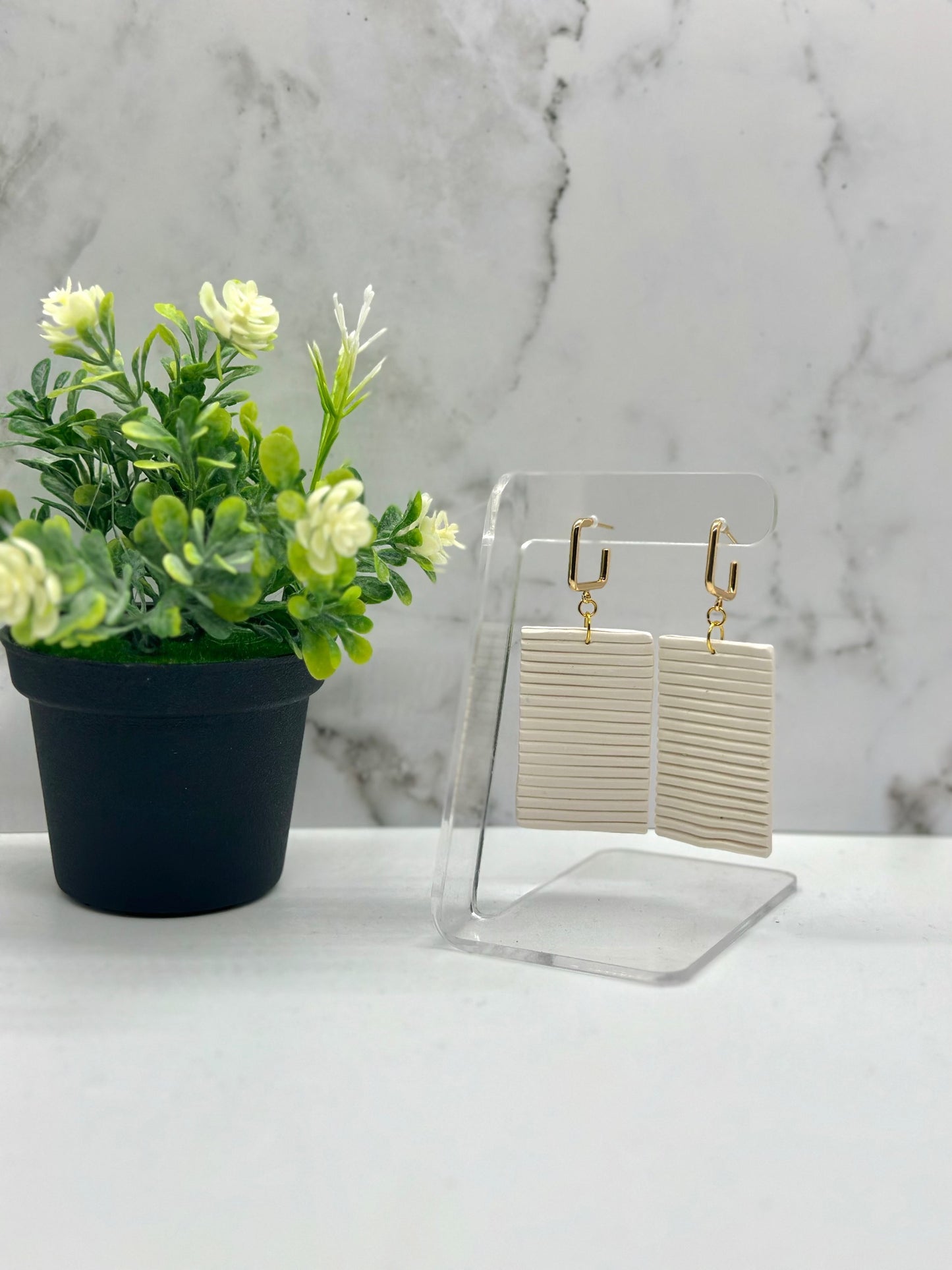 Large rhite rectangular dangle earrings inspired by Bermuda cottage shutters, available in small and large sizes by Tassel Bermuda.
