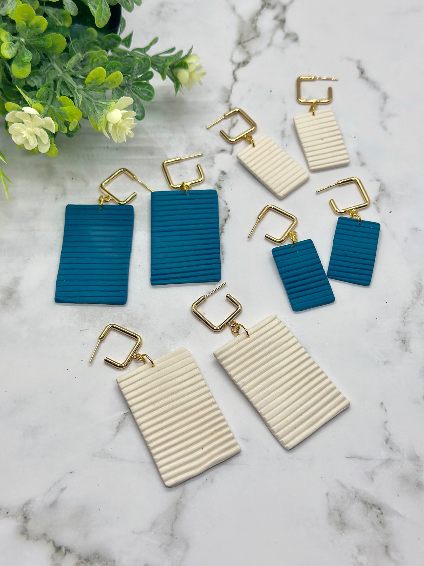 Rectangular pastel dangle earrings inspired by Bermuda cottage shutters, available in small and large sizes by Tassel Bermuda.