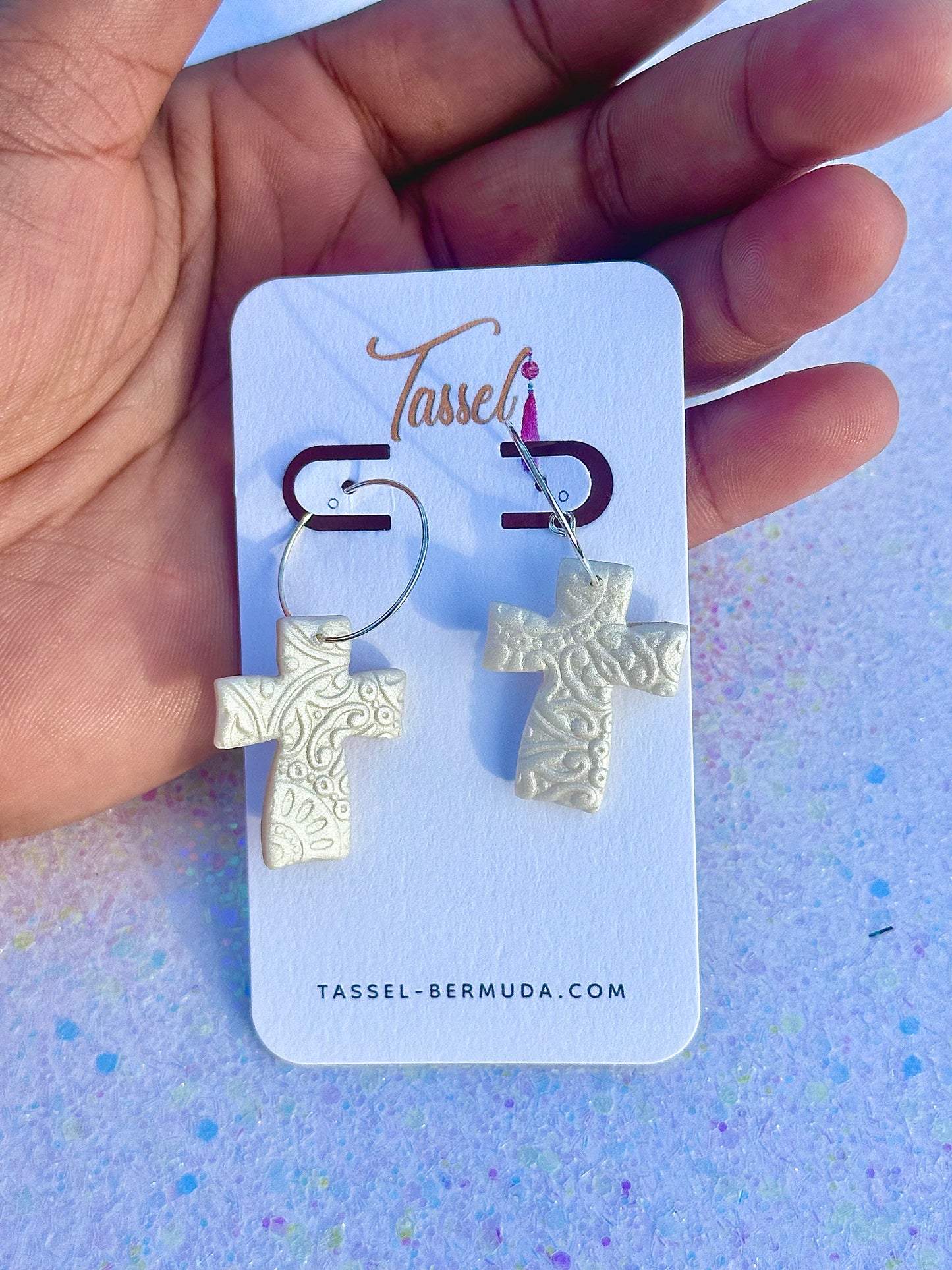 Kross – White Iridescent Cross Hoop Earrings with Textured Detail by Tassel Bermuda