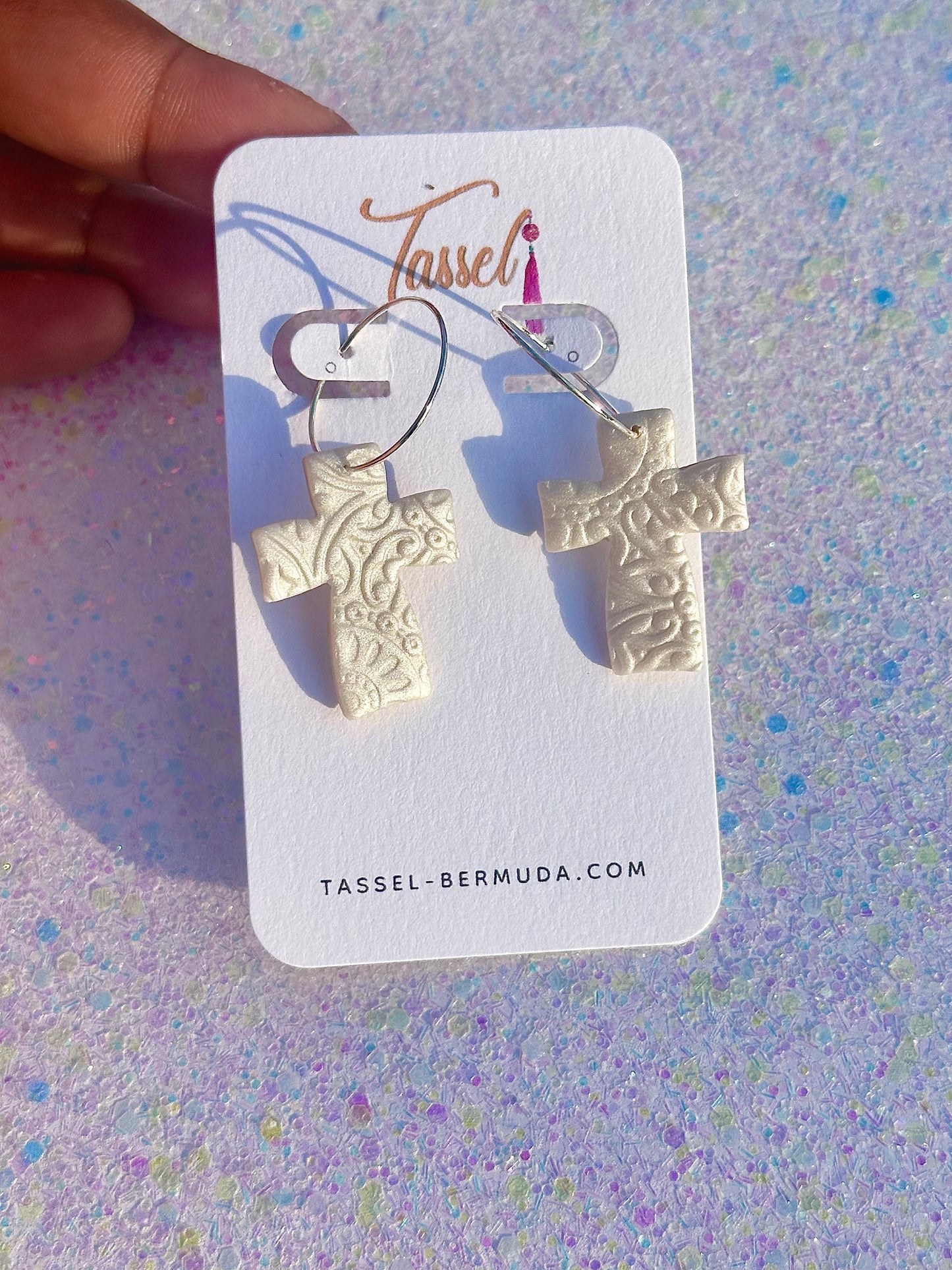 Kross – White Iridescent Cross Hoop Earrings with Textured Detail by Tassel Bermuda
