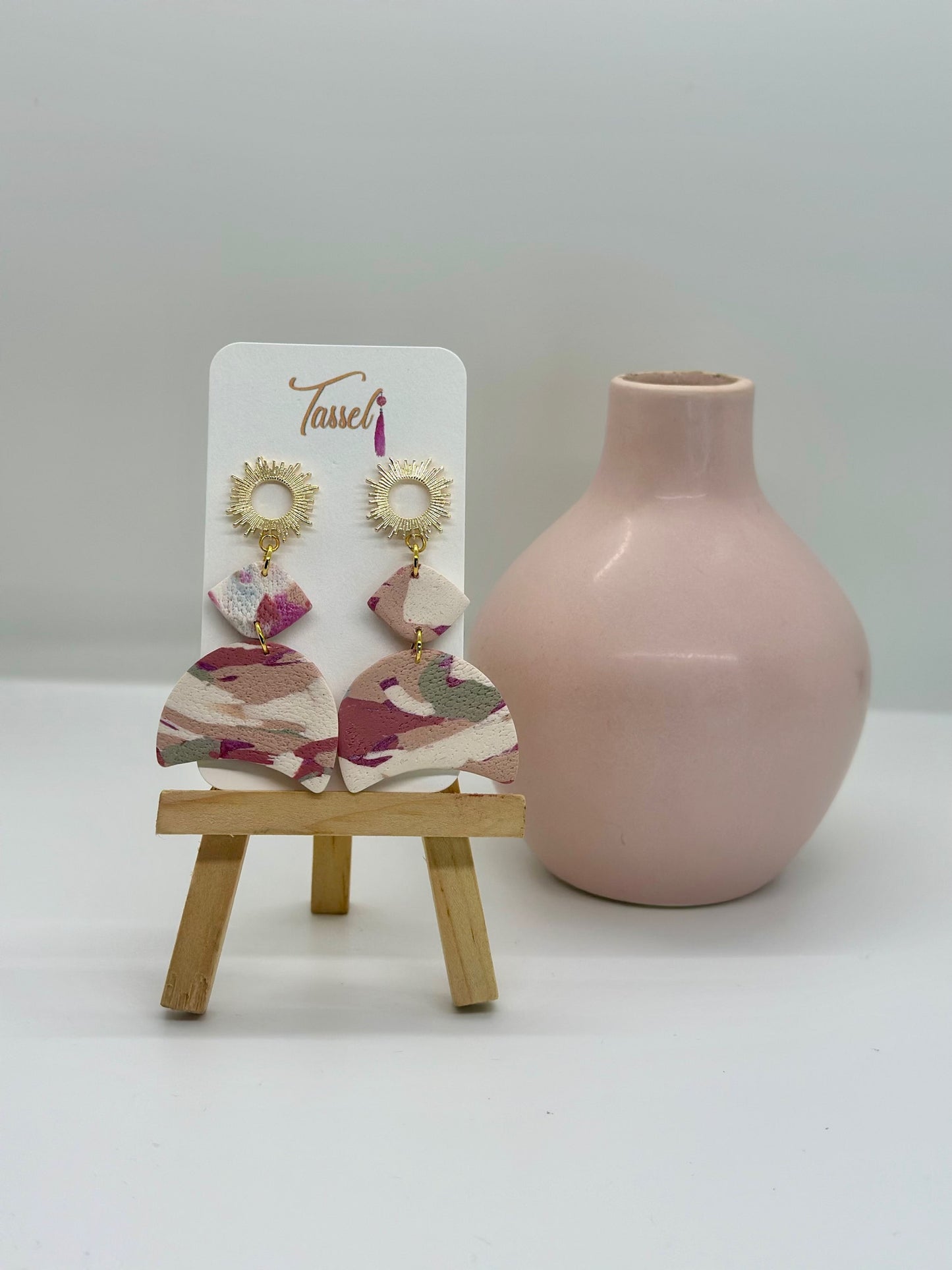 Solara Dangles – Multicolor Pink & Earth Tone Sunburst Polymer Clay Earrings with Gold Accents by Tassel Bermuda