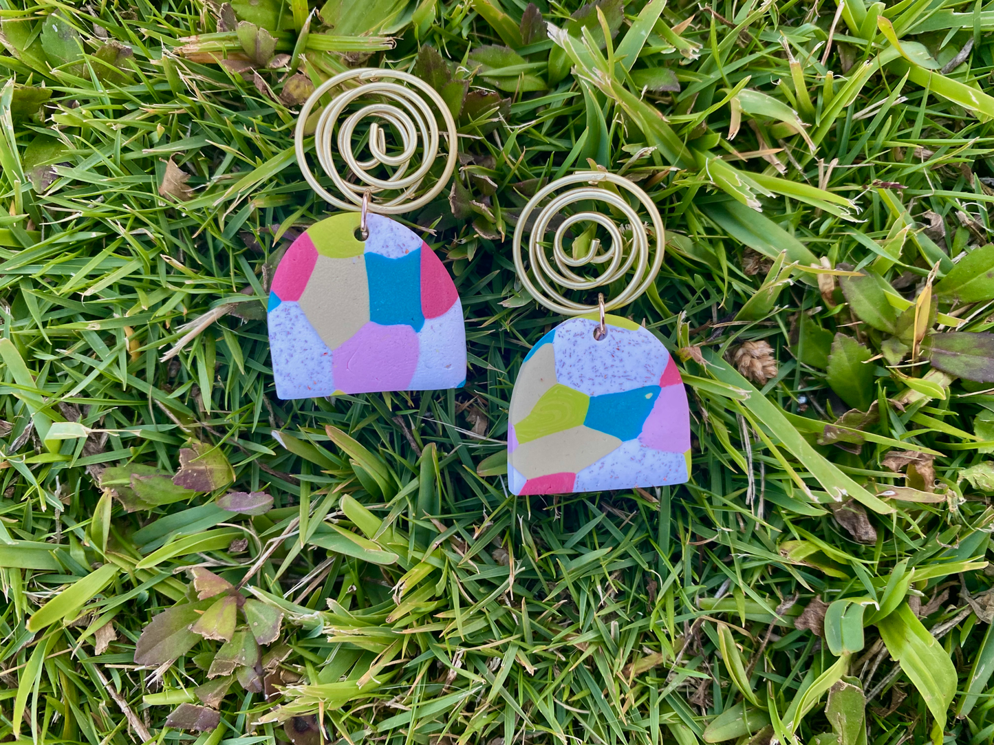 Multicolor clay earrings with gold accents, perfect for spring outfits