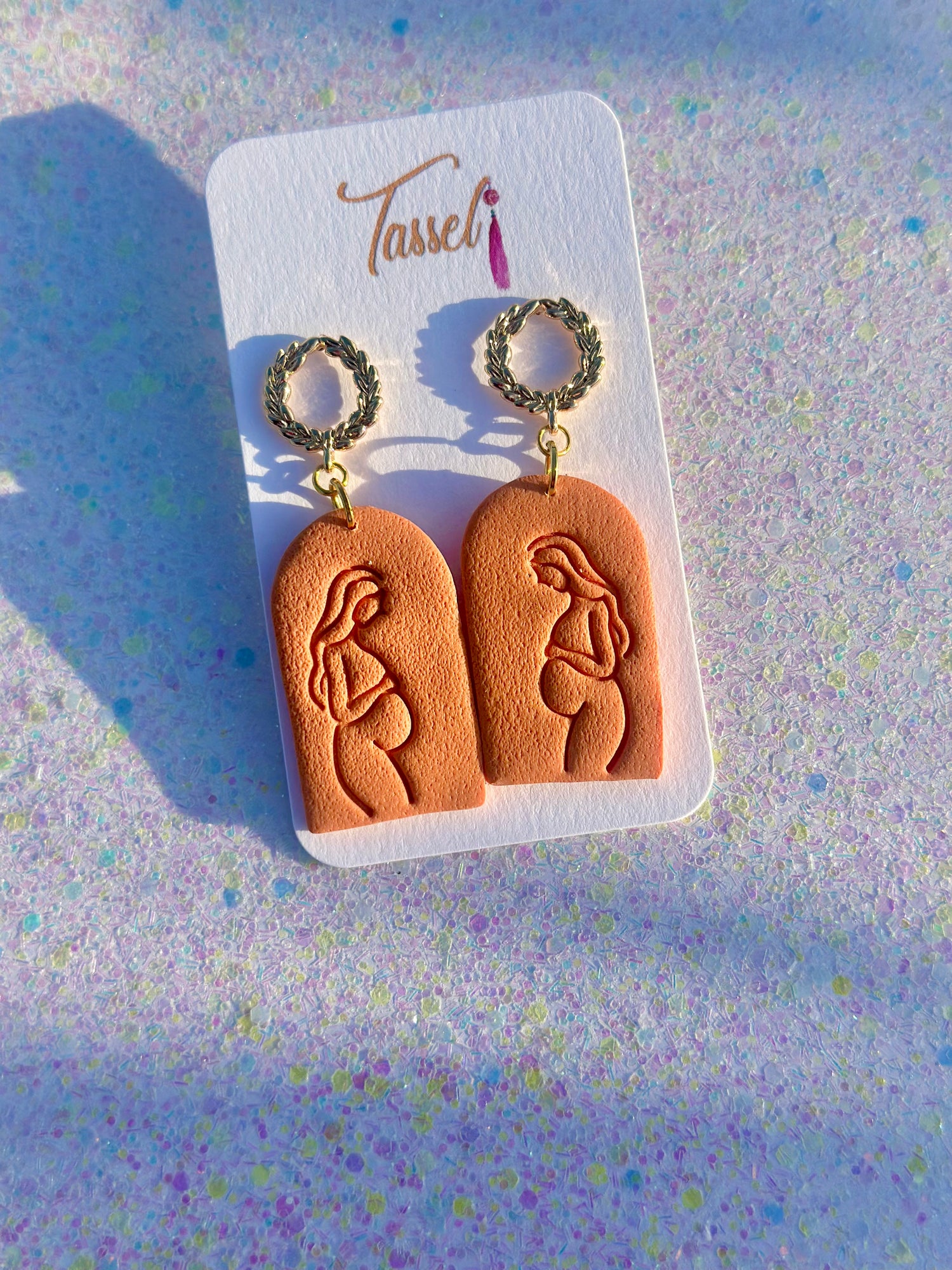 Abrianna – Embossed Pregnant Woman Polymer Clay Earrings with Gold Halo Wreath Post by Tassel Bermuda