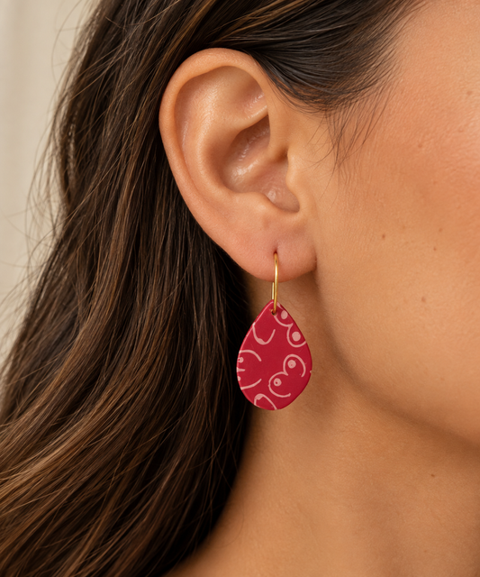 Pink illustrated breast drop earrings celebrating every body from the Adira Collection by Tassel Bermuda