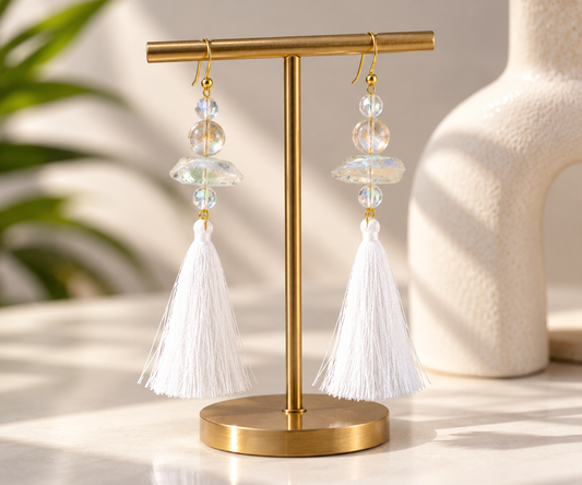Blanca white tassel dangle earrings with clear iridescent beads and gold-tone hooks by Tassel Bermuda