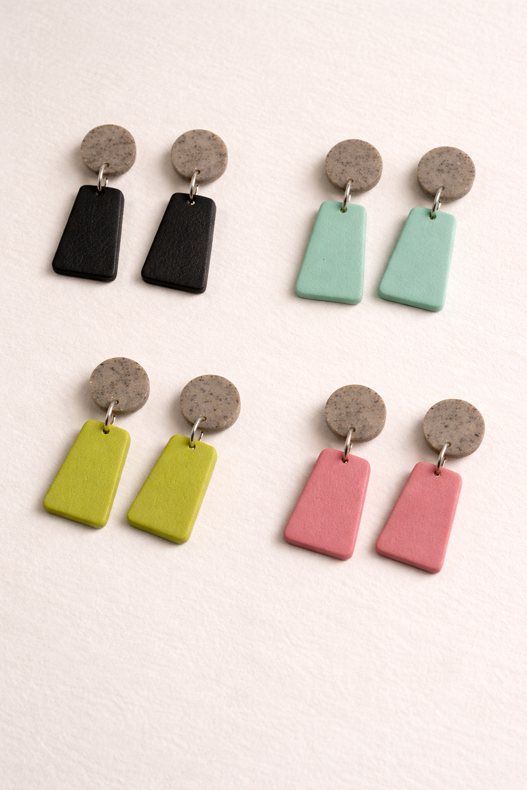 Clean Cut polymer clay dangle earrings with speckled round stud and rectangular drops in multiple colors including black, green, pink, and mint.
