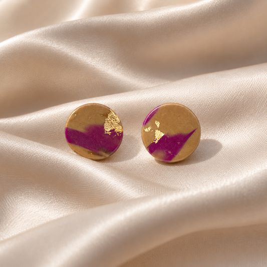 Fall handcrafted polymer clay round stud earrings in caramel brown and magenta with gold foil details by Tassel Bermuda