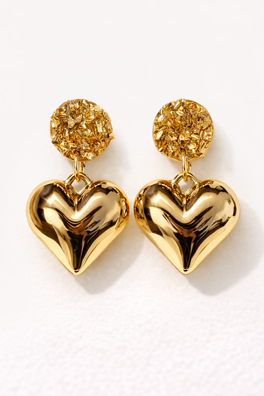 Heart of Gold dangle earrings with textured gold stud and shiny gold heart charm on a clean white background.