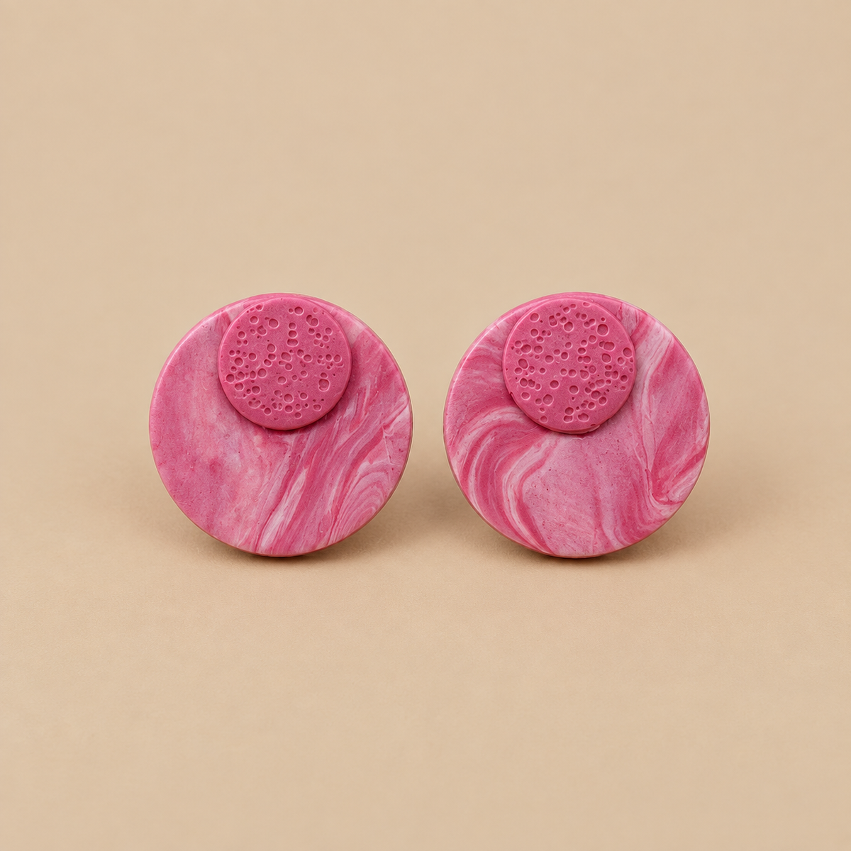 Kate pink marbled polymer clay jumbo stud earrings with textured circle detail handcrafted by Tassel Bermuda